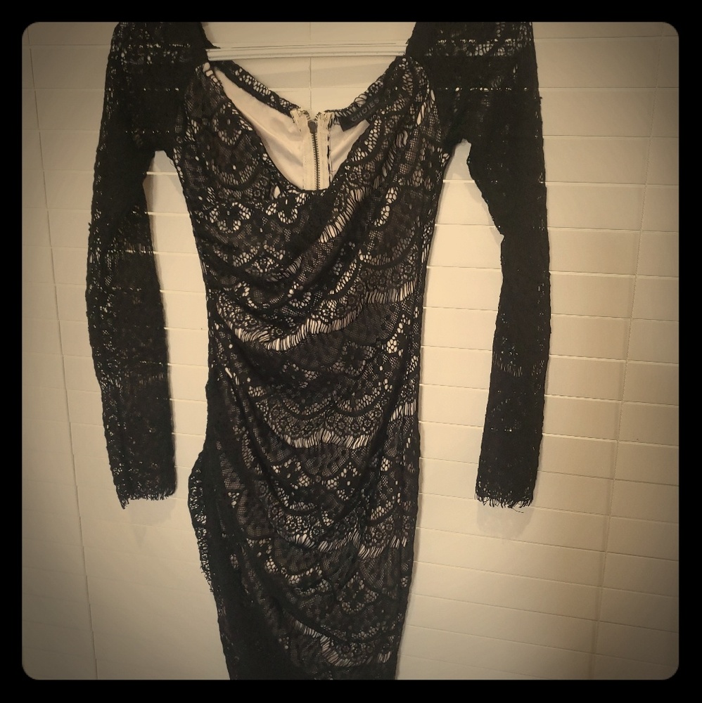 Black lace Bodycon mini dress 😘